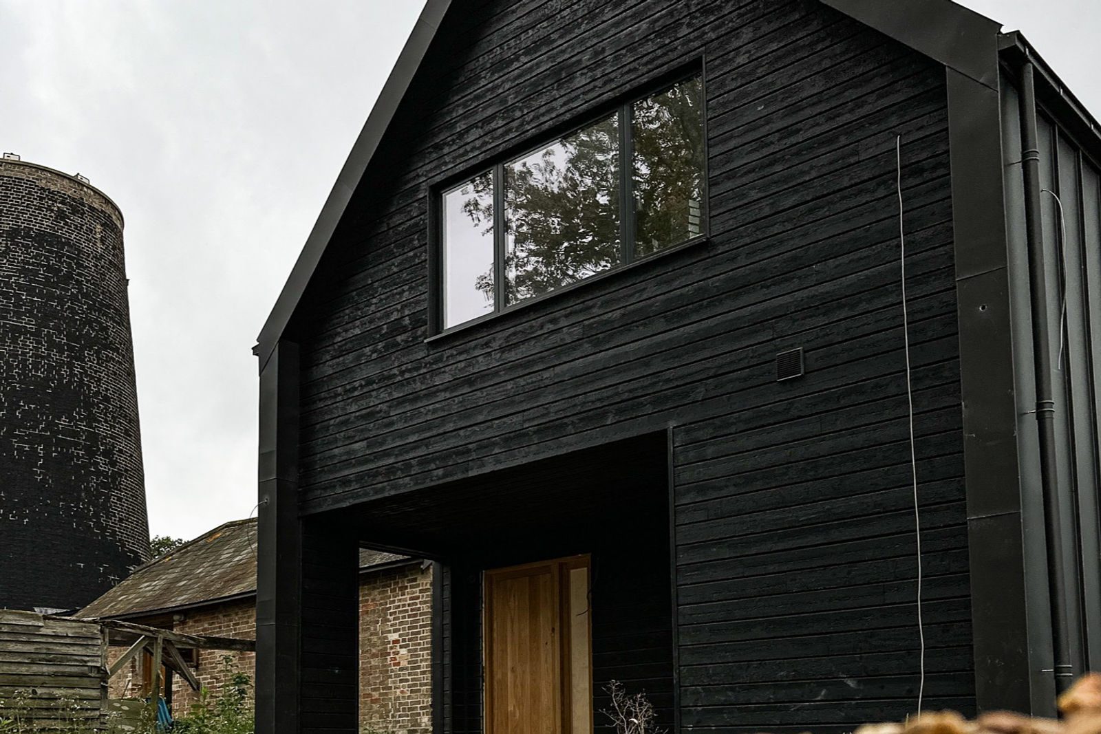 Black charred timber facade on a gabled building