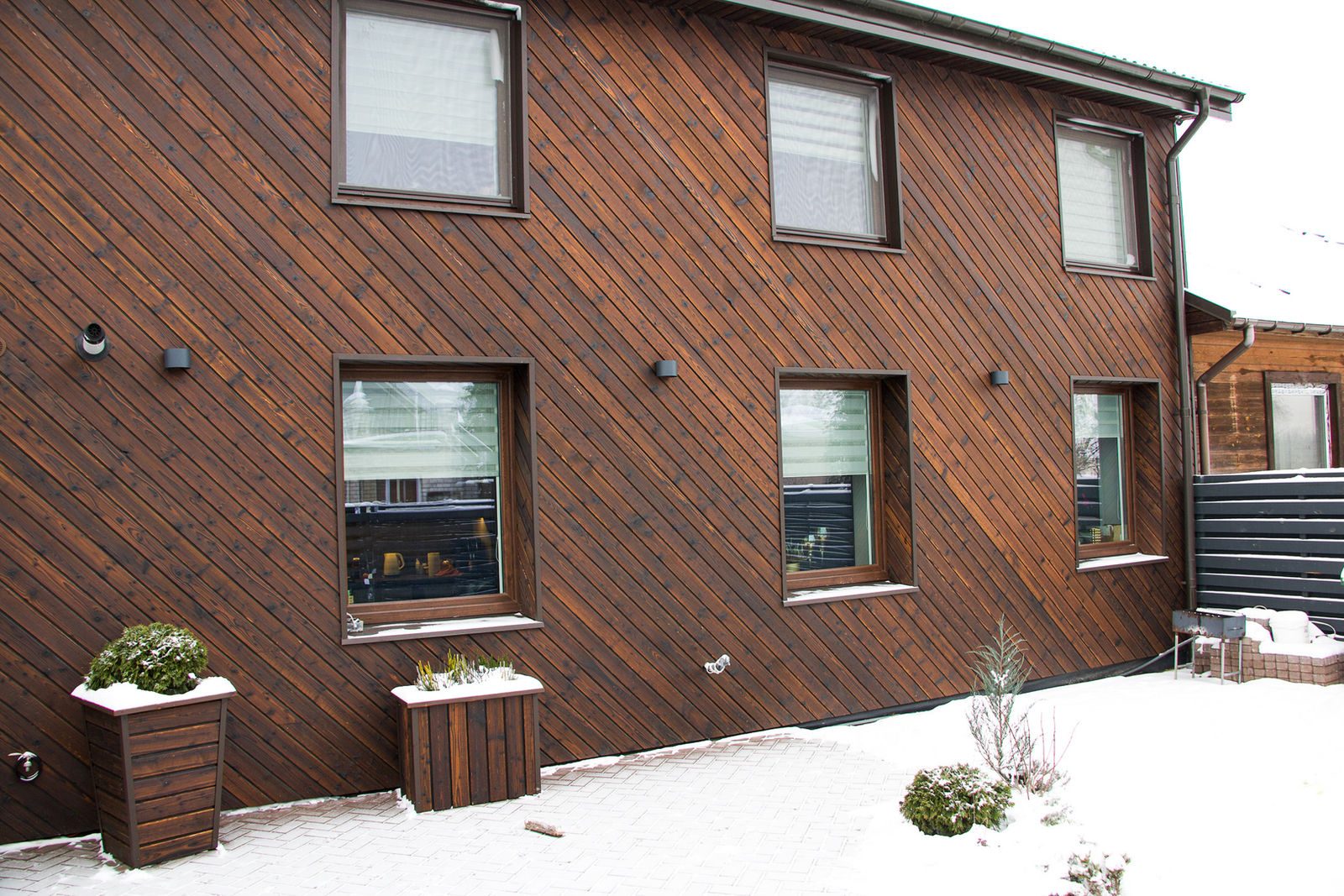 Charred timber facade in a warm brown tone